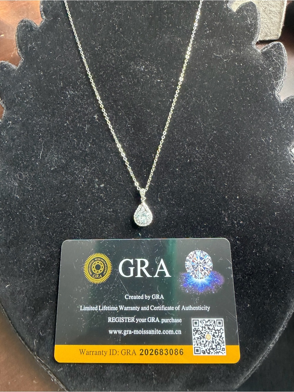 Moissanite Teardrop Pendant Necklace in Silver